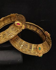 Simply a mark of royalty and elegance!! Handcrafted in brass with gold plating and fine quality Kundan stones. Set of 2 For wrist Size 2.4 Inner Diameter: 2.25 inches Not Openable The bangles are the same as shown in the pictures. We have only one piece in this color and design, hence you get what you see in the pictures. Gold-tone Metal Bangle For Wedding, Gold Jewelry With Intricate Design For Marriage, Gold Bracelets With Intricate Design For Marriage, Gold Bracelets With Detailed Design For Marriage, Gold Metal Bracelet For Weddings, Gold Jeweled Bangle For Festivals, Gold Bangle For Marriage, Traditional Yellow Gold Bangle For Celebration, Gold Bracelet For Wedding And Festivals