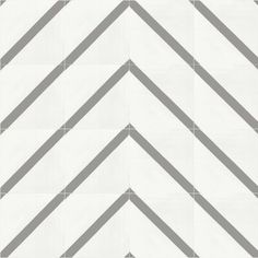 a white and gray tile with diagonal lines on it's sides, as well as an image of the same pattern