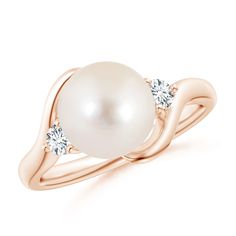 Held between a plain bypass shank is a lustrous Freshwater cultured pearl. It is flanked by prong-set diamonds that lend a dose of brilliance to this 14k rose gold ring. Cultured Pearl Ring, Pearl Rings, Golden South Sea Pearls, June Birthstone Jewelry, Jewelry Appraisal, Bypass Ring, 14k Rose Gold Ring, Sea Pearl, 18k Yellow Gold Ring