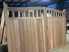 a wooden gate in the middle of a building