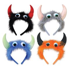 four different colored furry animal headbands with big eyes and long horns on them