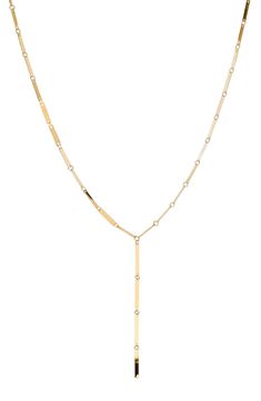 Crafted from polished 14-karat gold, this lariat necklace can be worn as a singular or layered piece. 16" length 14k gold Made in the USA Minimalist 14k Yellow Gold Lariat Necklace, Luxury Delicate Lariat Chain Necklace, Gold Timeless Lariat Necklace For Formal Occasions, Timeless Gold Lariat Necklace For Formal Occasions, Timeless Gold Lariat Necklace For Formal Events, Polished Lariat Necklace For Gift, Polished Finish Lariat Necklace For Gift, Lariat Necklace With Polished Finish As Gift, Timeless Gold Lariat Necklace With Adjustable Chain