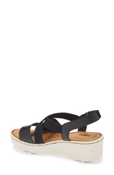 With a cushy insole, this casual slide sandal offers lasting comfort to be a weekend wardrobe favorite. 1 1/2" heel; 1" platform Adjustable slingback strap with hook-and-loop closure Leather upper/textile lining/synthetic sole Imported Black F, Platform Slides, Weekend Wardrobe, Sandal Women, Slide Sandals, Nordstrom Rack, Womens Sandals, Leather Upper, Size 10