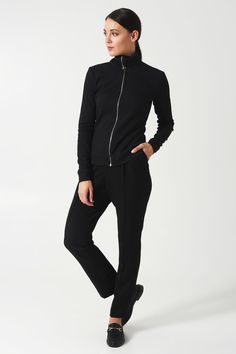 "A black turtleneck women's sweater featuring high neck, long sleeves, and a zipped front fastening. - high neck - long sleeves - shift silhouette - front metal zipper closure Color: black Fabric - viscose - 80%, polyester - 15%, elastane - 5%. For Size S: length - 25\" (63,5 cm) Our model wears a 06 US size and is 177cm/5'9\" tall MORE ITEMS: https://www.etsy.com/shop/TAVROVSKA?ref=hdr_shop_menu" Fitted Outerwear With Ribbed Cuffs And Stand Collar, Fitted Winter Sweater For Loungewear, Black Turtleneck For Workwear In Fall, Black Turtleneck For Fall Workwear, Casual High Neck Outerwear For Work, Relaxed Fit Turtleneck For Winter, Solid Color Long Sleeve Sweatshirt With Zipper, Long Sleeve Sweater With Zipper For Layering, Long Sleeve Sweater With Zipper Closure For Layering