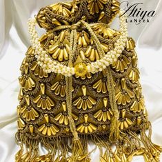 Beautifully Handcrafted Beaded Handbag Made From Satin Crepe. Designer Gold Tote Box Bag, Luxury Gold Pouch Satchel, Designer Bucket Bag As Gift, Designer Gold Rectangular Bucket Bag, Luxury Gold Pouch Bag, Luxury Gold Rectangular Bucket Bag, Designer Embroidered Tote Bag, Designer Gold Bucket Bag For Everyday Use, Designer Handheld Bag As Gift