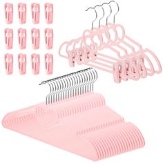 pink plastic hangers and clips on a white background