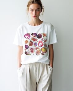 Figs botanical art print t shirt. * Regular fit, unisex * 100% ring-spun cotton * Medium fabric == SIZE == Please check the size guide in the images section to avoid disappointment. Compare your fav shirt to the size chart I've added and choose accordingly. Runs true to size. For a relaxed/loose fit size up 1 size from your regular size.  For an oversized fit or for a t-shirt dress look, we suggest sizing up two sizes. == SHIPPING & DELIVERY == I have print partners in the US and in Europe. Your Relaxed Fit Graphic Tee With Watercolor Print, Graphic Tee With Watercolor Print In Cotton, Relaxed Fit Watercolor Print Graphic Tee, Summer Graphic Tee With Watercolor Print, Summer Watercolor Graphic Tee, Crew Neck T-shirt With Watercolor Print, Casual Watercolor Print T-shirt With Relaxed Fit, White Graphic Tee With Fruit Print, Crew Neck Cotton T-shirt With Watercolor Print