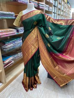 Envelope yourself in the beauty of this exquisite Kanjeevaram Silk Saree NK- 014. Crafted from the finest silk, this saree exudes luxury and sophistication. Feel the natural texture of this gorgeous piece as you make a statement at your next special occasion. Ready to Ship! Art Silk Pre-draped Saree With Pallu For Rituals, Elegant Art Silk Dupatta For Rituals, Silk Traditional Wear For Festive Rituals, Elegant Traditional Wear For Navratri Rituals, Festive Silk Traditional Wear For Rituals, Pre-draped Saree For Diwali Rituals, Elegant Festive Dupatta For Rituals, Elegant Banarasi Silk Traditional Wear For Rituals, Elegant Saree With Zari Weaving For Rituals