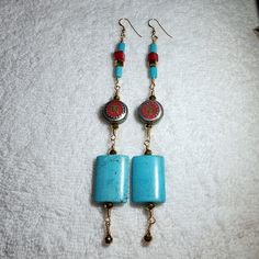 These Are Made With, - Reconstituted Turquoise Beads - Red Square Cut Coral Beads - Faceted Gold Glass Beads - Wire Wrapped In Gold Filled Wire And Gold Filled Earhooks Handmade Turquoise Large Beads Drop Earrings, Turquoise Drop Earrings With Large Beads, Bohemian Blue Beaded Earrings With Natural Stones, Turquoise Earrings With Large Beads For Gifts, Turquoise Dangle Earrings With Large Beads, Turquoise Bohemian Earrings With Beaded Chain, Blue Bohemian Beaded Chain Earrings, Bohemian Turquoise Beaded Chain Earrings, Turquoise Earrings With Beaded Chain And Round Beads