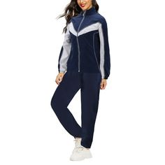 Women's classic relaxed fit tracksuit comes with a traditional retro design with a stripe across the chest. Full zip closure can be zipped all the way up for a stand collar, look or left unzipped for a more casual spread collar appearance. Made out of lightweight soft material, this 2 piece tracksuit is ideal for casual all day wear running errands or can also be used for exercising, gym workouts, jogging or other activities. The material is breathable & water resistant. Material: 100% Polyester Sporty Tracksuit With Pockets For Leisure, Casual Striped Activewear For Sports, Casual Sports Tracksuit With Side Stripes, Casual Tracksuit With Side Stripes For Sports, Blue Relaxed Fit Tracksuit With Long Sleeves, Blue Relaxed Fit Long Sleeve Tracksuit, Casual Cotton Track Jacket For Jogging, Blue Cotton Tracksuit For Jogging, Blue Relaxed Fit Tracksuit Athleisure