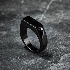 A simple but stylish way to keep your loved one with you at all times. A small quantity of ashes can be inserted into the ring by removing the screw cap to reveal a cavity below. Comes complete with the accessories needed to safely insert the ashes. Black Stainless Steel Jewelry For Memorial, Black Minimalist Signet Ring For Everyday, Black Stainless Steel Signet Promise Ring, Adjustable Black Minimalist Signet Ring, Modern Matte Black Jewelry For Gifts, Modern Matte Black Jewelry As Gift, Modern Matte Black Jewelry As A Gift, Minimalist Black Signet Promise Ring, Cremation Rings