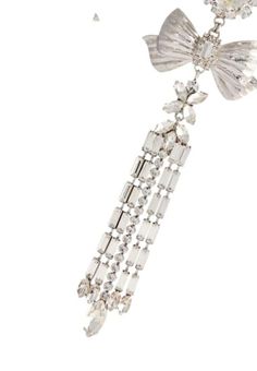 These long clips are a wanted addition to any sophisticated look. Sparkling translucent crystals that effectively refract the light. Made of light jewelry alloy with a galvanized silver coating.Clips closing.Brass.Silver plating.Glass.Height 55 cm, width 5 cm, depth 1.4 cm.Made in Italy. Silver Crystal Clip-on Earrings For Formal Events, Luxury Silver Metal Clip-on Earrings, Glamorous Silver Clip-on Jewelry, Silver Clip-on Crystal Earrings For Party, Luxury Silver Clip-on Earrings For Evening, Silver Crystal Clip-on Jewelry, Party Crystal Clip-on Jewelry, Party Silver Crystal Clip-on Earrings, White Gold Clip-on Earrings For Evening