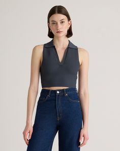 It’s giving preppy chic. Our Cropped Polo Ribbed Knit Tank has structured style and a textured-yet-soft feel. We love the contemporary cropped fit and subtle collar. Also available in Halter, Square Neck, Mock Neck, and One Shoulder silhouettes.  | Quince | Women's Cropped Polo Ribbed Knit Tank Top in Grey, Size Small, Recycled nylon/polyester/spandex Solid Color Cropped Knit Top, Chic Solid Color Cropped Knit Top, Chic Textured Knit Crop Top, Chic Knit Top For Work With Seamless Collar, Trendy Cropped Tops With Ribbed Collar, Chic Cropped Textured Knit Top, Ribbed Knit Tank Top, Cropped Halter Top, Cropped Polo