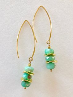 "Rustic raw green chrysoprase rondelle earrings on 24k gold vermeil Bali ear wires. Natural chrysoprase gemstones are faceted 7mm rondelles in beautiful apple green color with slight brownish imperfections. Still lovely and slightly polished accented with gold plated wavy discs and solid 24k gold vermeil faceted cubes. Gems hang from 24k gold vermeil Bali ear wires. Total drop is 2 1/4\". Chrysoprase is said to be a healing gemstone that promotes joy and happiness!" Gold Chrysoprase Earrings As A Gift, Gold Chrysoprase Earrings For Gift, Gold Chrysoprase Gemstone Earrings, Diy Gemstone Earrings, Czech Beads Jewelry, Apple Green Color, Rustic Earrings, Aquamarine Earrings, Hand Bracelet