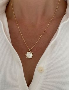 14K Gold Filled Mary Necklace, Shell Necklace, Satellite Chain Mary Necklace, Gold necklace, Necklaces for women, gift for her, birthday Dainty Mother Mary Shell Necklace Makes the perfect gift, layer it or wear it solo! MADE TO LAST  * 14k gold filled Mary charm 17mm * Shell with Cubic Zirconia Accents * 14k Gold Filled satellite chain or Cable chain  *Chose your perfect length *Shown at 18" on a size Small model for reference Water & tarnish resistant!  Gold filled jewelry is durable & tarnish Elegant Medallion Charm Necklace With Birthstone, Elegant Birthstone Medallion Charm Necklace, Spiritual White Necklace As Gift For Her, Elegant Medallion Necklace With Birthstone, Elegant Medallion Birthstone Necklace, Pearl Necklace With Initial Pendant As Gift, Dainty Pearl Necklace With Initial Pendant Gift, Pearl Pendant Medallion Necklaces For Anniversary, Pearl Necklace With Coin Pendant As Gift