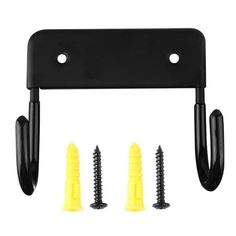 two yellow screws are attached to the side of a black wall mount with hooks