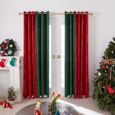 a living room decorated for christmas with red and green curtains