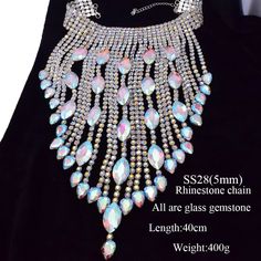 Level up your festival vibes with our Dazzling Crystal long irregular Tassel Necklace for Women. This stunning choker jewelry, bedecked with Shiny Glass Rhinestones, shimmers with a kaleidoscope of colors as you groove the night away. Crafted for both durability and flexibility, it's the ideal accessory to amp up your festival, concert, or special event style. Don't miss out on this mesmerizing festival must-have – grab yours today and dive into the festival magic! Festival Concert, Choker Jewelry, Womens Chokers, Wedding Accessory, Festival Vibes, Party Necklace, Rhinestone Choker, Dress Belt, Glamorous Wedding