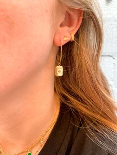 These tiny Huggies are perfect for a minimalist look, but add a little fun texture. 9 mm. They work in your lobe if you have smaller ears and they work very well in your cartilage or halfway up your ear! Great every day earring you don’t have to worry about. 100% US grade gold filled materials. Waterproof and tarnish resistant style. Very Well, Gold Filled, Every Day, Pearl Earrings, Texture, Gold