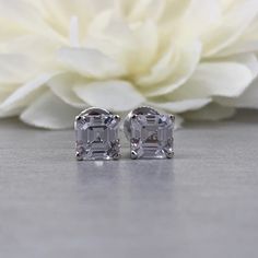 Sleek sellouts! 🤓. Order Moissanite Asscher Studs, White Sapphire Earrings, Asscher Cut Earrings, 2.00ctw. Studs, Screw Back Earrings, 14K White Gold Studs, #5019 at $219.00 #WhiteSapphire #DiamondEarrings #SquareEarrings #StudEarrings #MothersDay #BrideToBe #GiftForHer #AsscherCut #GoldEarrings #BirthdayGift Cushion Cut Wedding Rings, White Sapphire Earrings, Sapphire Anniversary, Emerald Wedding Rings, September Birthstone Rings, Moissanite Engagement Ring Halo, White Gold Studs, Cut Earrings, Solitaire Earrings