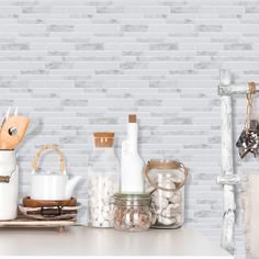 the kitchen counter is covered with various items