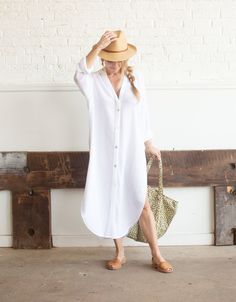 Effortless, classic, chic ... we can't say enough about this versatile shirt dress, handcrafted in Turkey from semi-sheer light cotton. Style it for city living over your favorite jeans or pack it for the coast as a beach cover up-turned-dinner dress. Lightweight 100% Turkish cotton One size: Length: 47.24'' (120 cm), Bust: 48'' (122 cm) , Waist: 48'' (122 cm) , Hips : 48'' (122 cm) , Sleeve Length: 30" (71 cm) Wash delicate or gentle cycle, lay flat to dry or tumble dry, no heat, do not bleach Video Ideas, Dinner Dress, Classic Chic, City Living, No Heat, White Shirt Dress, Black Shirt Dress, 4 Life, Beach Covers