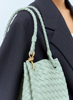 Large Parachute shoulder bag in Intrecciato woven leather. Twin top handles Open top with interior magnetic fastening Intrecciato weave One main compartment Interior detachable zip pouch Made in Italy 100% Leather Color: Green Code: 796571 VCPPT 3401 SKU: bov0257063grn Our Products Are 100% Genuine. In All Cases We Stand By The Authenticity Of Every Product Sold On Our Site. Intrecciato Weave Crossbody Bag For Office, Office Bags With Braided Top Handles, Office Bags With Top Handle And Braided Handles, Office Bag With Braided Top Handle, Office Intrecciato Weave Crossbody Bag, Modern Shoulder Bag With Intrecciato Weave, Modern Shoulder Bag With Intrecciato Weave For Daily Use, Office Shoulder Bag With Intrecciato Weave And Double Handle, Office Shoulder Bag With Double Handle And Intrecciato Weave