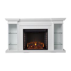 a white fireplace with an electric fire in the center and shelves on either side that are open