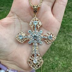 Beautiful Statement Piece, Gothic Cross Pendant Embedded With Sparkling Cubic Zirconia Gemstones On A Stainless Steel 316l Rope Chain. *Chain Length: 50cm Or 60cm.(Let Me Know Which One Would You Like (- : *Chain Material: Stainless Steel. *Cross Pendant Length:75cm *Cross Material: Zinc Alloy And Crystals. Will Ship Next Day Or Same Day If Possible. Make A Bundle Of 2 Or More Items And Save $2 (Message Me First!) #Bigcross #Crystaljewelry #Rosarynecklace #Crossnecklace #Grungenecklace Tags: Got Gothic Gold Cross Pendant Jewelry, Crystal Cross Jewelry With Chain, Crystal Cross Chain Jewelry, Cross-shaped Rhinestone Jewelry For Parties, Cross Shaped Rhinestone Jewelry For Parties, Cross Shaped Rhinestone Party Jewelry, Gothic Crystal Jewelry For Gift, Cross-shaped Rhinestone Necklace With Bling For Gifts, Cross-shaped Rhinestone Necklace With Bling As Gift