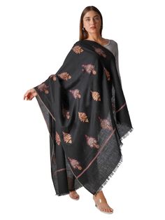 Wrap yourself in sophistication with our Stylish Black Pashmina Shawl, featuring elegant embroidery that adds a touch of luxury to any outfit. Crafted from the finest pashmina, this shawl offers unparalleled softness and warmth, making it an essential accessory for every occasion. Product Details: Hand Embroidered Kashmiri Pashmina Shawl Material: Pure Pashmina (100% Cashmere) Size: 100 cm X 203 cm / 40 Inch X 80 Inch / 1.1 x 2.2 Yards (Approx) Color: Black with intricate embroidery Embroidery: Black Pashmina Shawl With Embroidered Border, Elegant Black Festive Shawl, Elegant Black Pashmina Shawl With Embroidered Border, Embroidered Black Shawl Dupatta, Luxury Pashmina Shawl For Festive Occasions, Embroidered Black Dupatta Shawl, Elegant Embroidered Pashmina Fabric For Eid, Elegant Black Pashmina Shawl For Festive Occasions, Festive Black Shawl With Traditional Drape