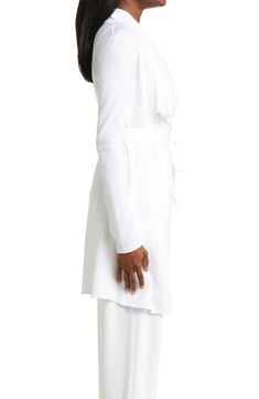 Fashioned from organic pima cotton, this robe sports a drapey silhouette so you'll stay cozy while lounging. Shawl collar Long sleeves 100% organic cotton Machine wash, dry flat Imported Chic Long Sleeve Loungewear Robe, Fitted Robe For Loungewear In Fall, Fitted Spring Robe For Loungewear, Fitted Robe For Spring Loungewear, Fitted Fall Robe For Loungewear, Fitted Fall Loungewear Robe, Open Front Cotton Top For Loungewear, Cotton Open Front Tops For Loungewear, Relaxed Fit Open Front Top For Daywear