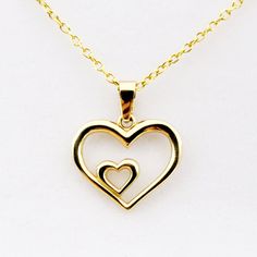 "10K Yellow Gold Pendant Heart Shaped Pendant Height: 0.63″ Pendant Width: 0.55″ * Comes in a Beautiful Gift Box , Perfect for Gifting ------------------------------------------------- Chain options: - Gold plated sterling silver chain 16\", 18\" - 10KT Yellow Gold 16\",18\", 20\" - 14KT Yellow Gold 16\",18\", 20\" - Thickness is 1-1.2mm - Weight is 1-2 grams ------------------------------------------------ * Please click here to visit my shop: https://www.etsy.com/shop/bestjewelryset * To see m 14k Stamped Double Heart Jewelry For Valentine's Day, Valentine's Day 14k Stamped Double Heart Jewelry, Double Heart 14k Stamped Necklaces For Anniversary, White Gold Hallmarked Heart Necklace For Valentine's Day, Valentine's Day Anniversary Gift Hallmarked Necklace, 14k Stamped Gold Heart Necklace For Anniversary, Yellow Gold Double Heart Jewelry Gift For Mom, 14k Gold Heart Necklace For Valentine's Anniversary, Gold Hallmarked Heart Necklace For Valentine's Day