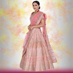 Looking for an elegant and traditional pink bridal lehenga for your wedding day? Look no further than this beautiful piece, made with luxurious silk and finished with gorgeous temple border embroidery on the dupatta and beautiful henna design embroidery on the lehenga. The entire piece is adorned with diamond work, making it truly special and perfect for your big day. You'll feel like a royal princess in this lovely lehenga! Royal Pink Lehenga, Glamorous Pink Wedding Lehenga, Pink Lehenga With Intricate Embroidery, Fusia Pink Lehenga Bridal, Pink Lehenga With Embroidered Border, Lehenga For Wedding, Pink Bridal Lehenga, Beautiful Henna, Beautiful Henna Designs