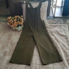 Good Luck Gem Woman's Jumpsuit. Brand New Never Wear At All .It's Nordstrom Buy .Size M .Please Don't Ask For Lower Price . I Had To Sell It With This Low Price Because It Is Not My Size .Otherwise I Keep It Because It Beautiful Elegant Piece. Must Have In Any Woman Closet . Green Overalls For Work, Green Workwear Overalls, Fitted Wide Leg Overalls For Workwear, Wide Leg Jumpsuits With Button Closure For Work, Sleeveless Khaki Jumpsuit With Pockets, Green Wide Leg Jumpsuits For Work, High Waist Summer Overalls For Workwear, Summer Wide Leg Jumpsuit With Button Closure, Green Wide-leg Jumpsuit For Work