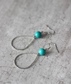 Lovely and simple drop earrings for everyday wear! Earrings was made from of turquoise stone 8 mm beads,dainty steel open drop charms, stainless steel earring hooks. Earring hooks are from nickel free and lead free metal. The total lenght of earrings is about 61 mm including earring hooks. Other earrings of my shop you can see here: https://www.etsy.com/shop/NaTavelli?section_id=13757927 Thanks for visit. Turquoise Teardrop Beaded Earrings As Gift, Turquoise Teardrop Beaded Earrings For Gifts, Bohemian Teardrop Earrings Nickel Free For Everyday, Adjustable Turquoise Teardrop Earrings, Bohemian Turquoise Teardrop Earrings For Jewelry Making, Turquoise Dangle Jewelry For Everyday, Bohemian Turquoise Teardrop Earrings, Everyday Turquoise Dangle Jewelry, Bohemian Teardrop Earrings With Natural Stones