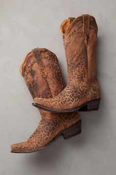 Embrace your edgy side with the western-inspired Leopardito handcrafted leather cowboy boots, featuring an intricate yoke-and-stud design. Made from durable goatskin leather with a distressed leopard print, these sassy boots offer easy on/off with their double pullstraps and smooth calfskin lining. Kick off festival season with this wild yet wearable style that lasts. Leopard Print Cowboy Boots, Leopard Cowboy Boots, Cowgirl Truck, Shoes Photoshoot, Women's Cowboy Boots, Cowboy Boots For Women, Cowboy Chic, Nice Boots, Leopard Print Bag