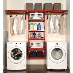 a washer and dryer sitting next to each other in front of a shelf