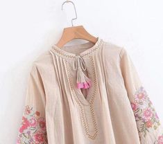 Product Details: Linen/Cotton Three quarter sleeve Tassel feature Floral pattern V-neck Lantern sleeve Vintage Chic Fashion, Tassel Shirt, Bohemian Mini Dress, Womens Boho Dresses, Bohemian Blouses, Tassels Fashion, Boho Shirts, Floral Print Skirt, Spring Women