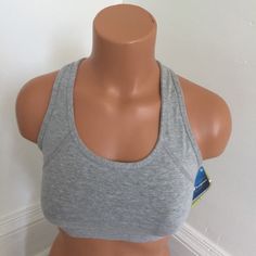 Champion Style # 6995 Woman Medium Support Sports Bra Brand New Never Used Guaranteed 100% Authentic Body = 79% Cotton , 9% Polyester 12% Spandex Mesh Insert = 84% Nylon , 16% Lycra/Spandex Liner = 90% Polyester , 10% Lycra ***Runs On The Small Side*** Fitted Gray Activewear For Light Sports, Comfortable Fitted Activewear For Light Exercise, Fitted Go-dry Sports Bra, Fitted Sports Top With Built-in Padding, Sporty Fitted Sports Bra With Go-dry Technology, Fitted Elastane Sports Bra, Casual Style, Comfortable Gray Sports Top, Comfortable Fitted Sports Bra For Gym, Fitted Gray Sweat-resistant Sports Bra