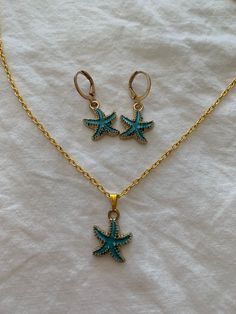 Blue starfish charm jewelry     * necklace     *earrings (Not watterproof Ocean-inspired Blue Jewelry With Star Charm, Starfish Shaped Jewelry With Star Charm As Gift, Beach Jewelry With Starfish Charm, Handmade Turquoise Starfish Jewelry, Turquoise Ocean-inspired Jewelry With Starfish Charm, Turquoise Starfish Ocean-inspired Jewelry, Blue Starfish Charm Jewelry For The Beach, Blue Star Charm Jewelry, Blue Star Charm Jewelry As Gift