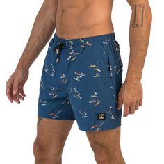 Ride the waves in style with our Caribbean Cove men's shorts. Inspired by the surf culture of the Caribbean, these shorts feature a trendy navy blue color scheme and a surf-inspired design. Perfect for the beach or the boardwalk, our shorts are made with high-quality materials that provide maximum comfort, durability, and flexibility. The elasticated waist and drawstring adjustment ensure a secure and comfortable fit, making them ideal for any activity. Whether you're surfing, swimming, or loung Navy Blue Color Scheme, Surf Culture, Blue Color Schemes, Navy Blue Color, The Caribbean, Men's Shorts, Summer Wardrobe, Color Scheme, The Hamptons