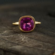 Cushion Cut Ruby Bezel Set Ring, Bezel Set Engagement Ring, 14K Solid Gold Solitaire Ring, July Birthstone  Ring, Promise Ring for Women    Main Stone: Ruby ( Lab-Created ) Main Stone Color: Red Main Stone Shape: Cushion S I L V E R J E W E L R Y C A R E Silver is not the best friend of oxygen and sulfur; it can be oxidized and tarnished from time to time it is the nature of silver. To keep the silver shiny and prevent it from oxidizing fast, we would recommend the following instructions; * Avoi July Birthstone Ring, Bezel Set Engagement Ring, Bezel Set Ring, Ring Bezel, Gold Solitaire Ring, Fancy Gifts, Set Ring, July Birthstone, Ring Promise