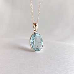 This stunning pendant is set in 14K Solid Yellow Gold with Natural Aquamarine with utmost precision. It is an unique gemstone pendant for nearly every occasion and is completely hassle-free jewelry. 🔷ABOUT GEMSTONE: Aquamarine is often considered a calming and soothing stone. It may help reduce stress, anxiety, and feelings of overwhelm, promoting a sense of tranquility and peace. Aquamarine is thought to enhance courage and inner strength. It may help individuals overcome fears and phobias and Aquamarine Jewelry Necklace, Aquamarine Gem, Handmade Jewelry Box, Aquamarine Pendant, Aquamarine Jewelry, March Birthstone, Bezel Pendant, Fancy Jewellery, Birthstone Pendant