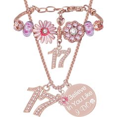 a pink necklace with charms on it that says i believe you're in love