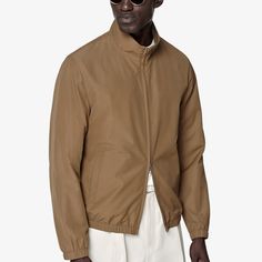 A
  stylish, versatile layer that's perfect for the seasonal transition, this
  relaxed mid-brown bomber jacket is unconstructed for a lightweight wear and
  undeniably casual appeal. Brown Overcoat, Polo Coat, Ermenegildo Zegna, Style Expert, Casual Jacket, High Collar, Fashion Advice, Personal Style, Bomber Jacket