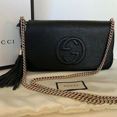 New With Tags! Gucci 536224 Soho Leather Chain Crossbody Bag, Black Brand: Gucci Style: 536224 New With Tag Color: Nero (Black) Leather Embossed Interlocking G Chain Strap With 20.5" Drop Leather Tassel Light Gold Tone Hardware One Interior Open Pocket One Interior Zip Pocket Made In Italy Flap With Magnetic Closure Approx. Dimensions: 10.6" L X 2" D X 6" H Comes With Original Tags, Dust Bag And Contrallato Cards. Gucci Soho Disco Bag, Soho Disco Bag, Gucci Style, Sequin Bag, Beige Bag, Crossbody Bag Black, Gucci Soho Disco Crossbody, Handbag Heaven, Black Leather Crossbody Bag