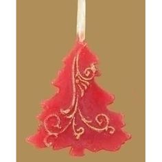 a red christmas tree ornament hanging from a string