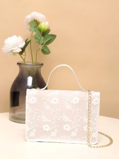 Bag For Love - Jacquard Floral Pattern Chain Square Bag - Women Satchels Product Description Color White Strap Type Chain Style Elegant Pattern Type Floral Bag Size Small Quantity 1 piece Type Square Bag Composition 100% Polyvinyl Chloride Material PVC Size Chart INCH CM Size Bag Width Bag Height Bag Length Strap Length one-size 2.4 5.5 7.5 47.2 Size Bag Width Bag Height Bag Length Strap Length one-size 6 14 19 120 Similar Products h2 { text-align: center; } .red-box { width: 100%; display: flex White Evening Bag With Chain Strap, White Evening Bag With Chain Strap As Gift, Rectangular Shoulder Bag For Spring Events, White Shoulder Bag With Chain Strap For Summer, White Summer Clutch For Formal Occasions, White Chain Strap Shoulder Bag For Summer, Formal Summer Shoulder Bag With Chain Strap, Spring Event Rectangular Bag, White Evening Bag For Spring Party