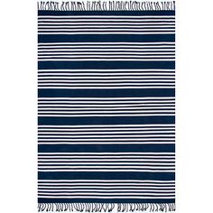 a blue and white striped rug with fringes