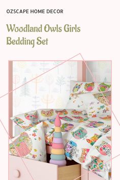 the woodland owls girls bedding set is shown in pink and white with geometric shapes